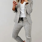 HOPE | Tweedelige set met getailleerde geruite blazer en bijpassende broek - Visconte