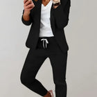 HOPE | Tweedelige set met getailleerde geruite blazer en bijpassende broek - Visconte