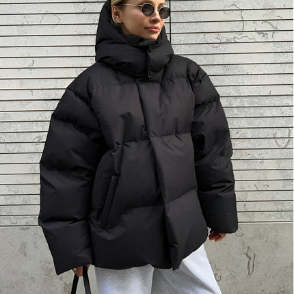 Warme Voering Dames Pufferjas Jeanie | Bruin | Waterdicht Polyester | Capuchon en Ruime Zakken | Wintermode XS-2XL | Comfortabele Pasvorm voor Koude Dagen | Verkrijgbaar in Meerdere Kleuren | Trendy Winterjas met Praktisch Ontwerp
