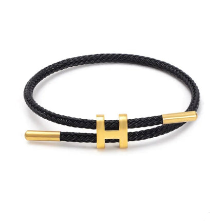 Armband Koord Gevlochten | Stijlvolle Metalen H-Sluiting | Modern Ontwerp | Veelzijdige Kleurenopties | Uniseks Accessoire | Tijdloos Vakmanschap | Minimalistisch & Laagjesstijl | Elegant Design | Fashion Statement