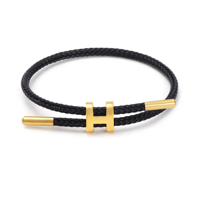 Armband Koord Gevlochten | Stijlvolle Metalen H-Sluiting | Modern Ontwerp | Veelzijdige Kleurenopties | Uniseks Accessoire | Tijdloos Vakmanschap | Minimalistisch & Laagjesstijl | Elegant Design | Fashion Statement
