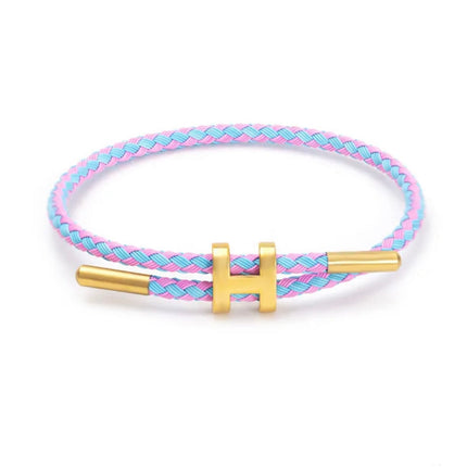 Armband Koord Gevlochten | Stijlvolle Metalen H-Sluiting | Modern Ontwerp | Veelzijdige Kleurenopties | Uniseks Accessoire | Tijdloos Vakmanschap | Minimalistisch & Laagjesstijl | Elegant Design | Fashion Statement