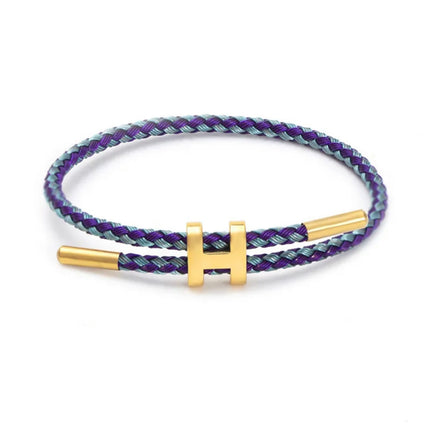 Armband Koord Gevlochten | Stijlvolle Metalen H-Sluiting | Modern Ontwerp | Veelzijdige Kleurenopties | Uniseks Accessoire | Tijdloos Vakmanschap | Minimalistisch & Laagjesstijl | Elegant Design | Fashion Statement