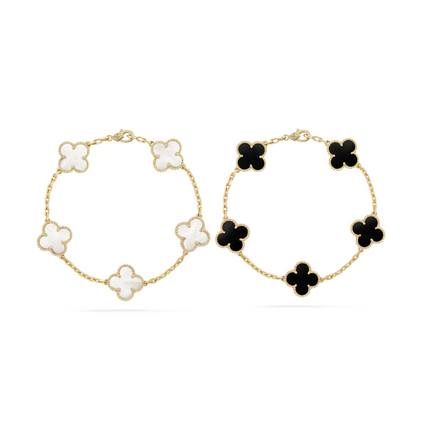 Dubai Armband Duo | Zwart Wit Klaver | Elegante Sieraden Set | Verfijnde Luxe Stijl | Goud Accent Accessoires | Modieuze Statement Armbanden | Tijdloze en Veelzijdige Look | Perfecte Balans en Contrast | Must-Have Accessoire voor Elke Gelegenheid